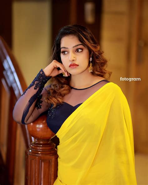 Malavika Menon In Yellow Saree With Black Blouse Photos 006