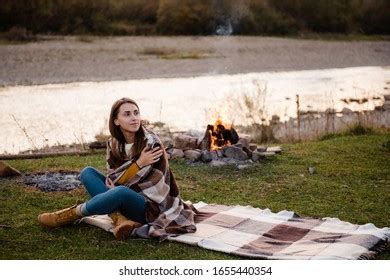 Couple Campers Lighting Fire While Near Stock Photo