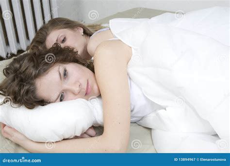 Sisters Cuddling In Bed Stock Image Image Of Pretty 13894967