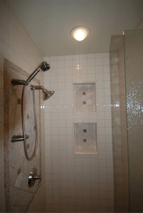Design a luxurious shower that fits perfectly in your home with kohler luxstone showers. Biscuit tile shower with tumbled stone accents, two ...