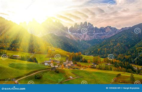 Colorful Autumn Scenery In Santa Maddalena Village At Sunrise Dolomite