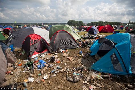 glastonbury festival clean up begins as 800 man litter team and magnetic tractors sweep across