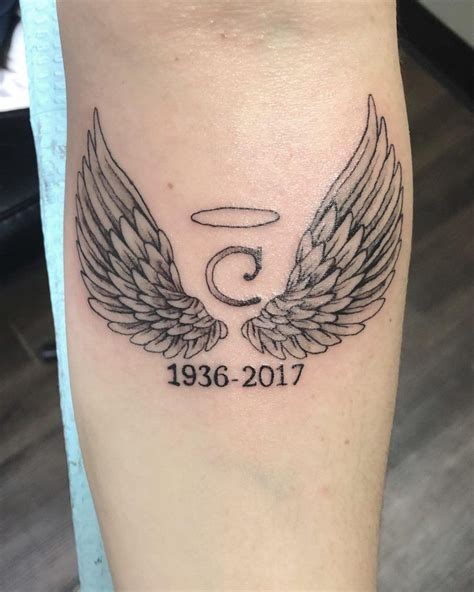 25 Amazing Angel Wings Tattoo With Name In The Middle Ideas In 2021