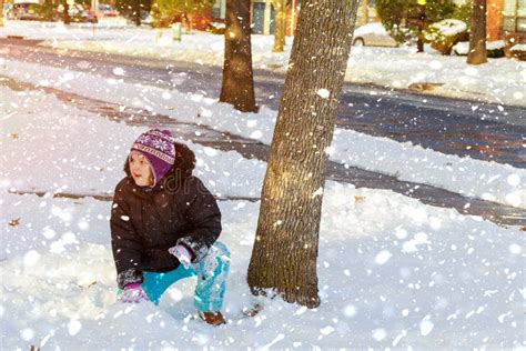 Good Winter Weather Happy Kid Is Playing In Snow In Snowflakes Stock