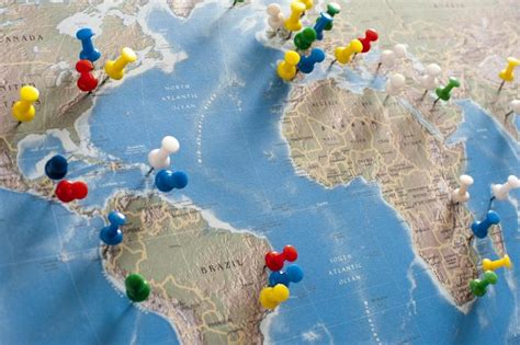 Image Of Colorful Pins Locating Destinations On World Map Freebie