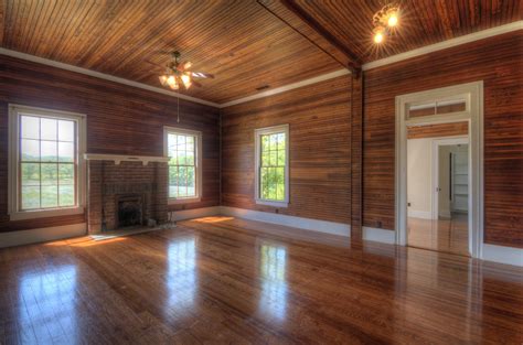 Interior Living Room With Wood Paneling T G Flooring