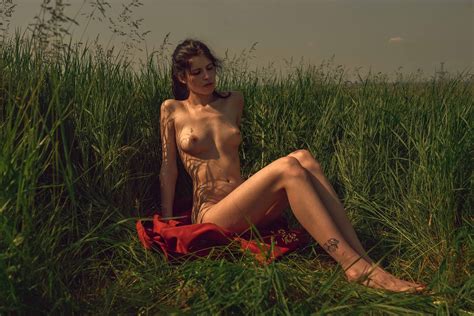 Naked In The Grass