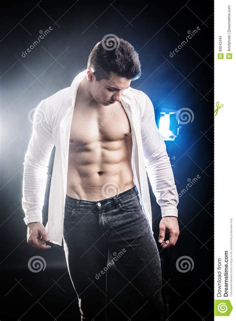 Confident Attractive Young Man With Open Shirt On Stock