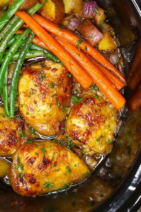 Pour over chicken in crockpot. Chicken thighs and veggies are cooked in a 6-quart slow ...