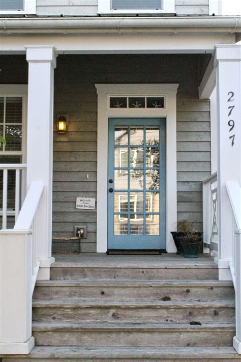 Great Porch Love The Worn Wood White Trim And Blue Door The Wicker