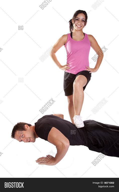 Imagen Y Foto Mujer Pisando Flexiones De Hombre Bigstock