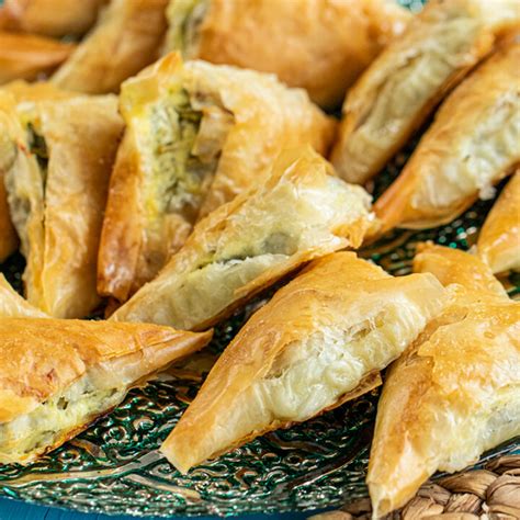 Spanakopita Greek Spinach And Phyllo Triangles Dimitras Dishes