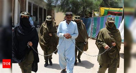 Photo Of Pakistans Women Cops Parading Man Accused Of Assaulting Niece