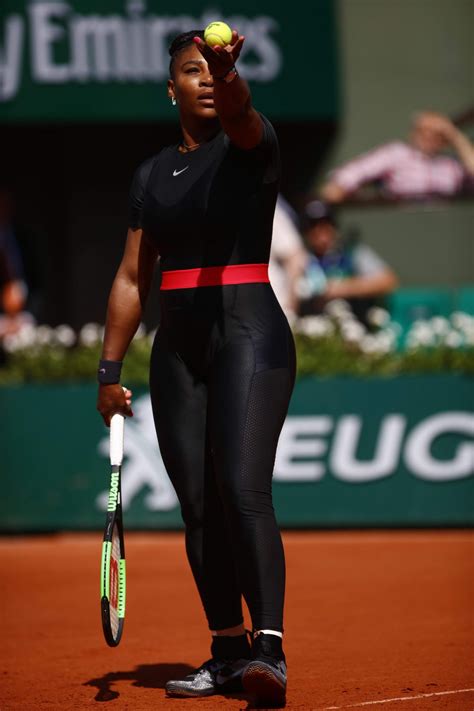 Man befriends cardinal bird outside his home. SERENA WILLIAMS in Tights at French Open Tennis Tournament ...