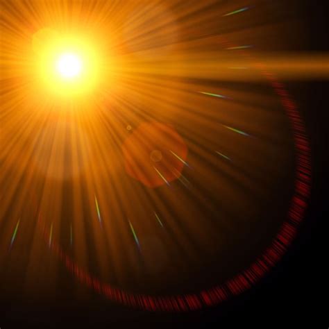 The Sun Is Shining Brightly In The Dark Sky With Lens Flares On Its Side