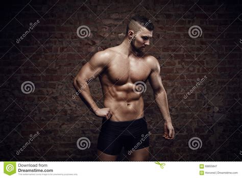 Young Muscular Man Posing Stock Image Image Of Strong 68855847