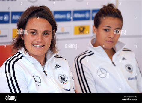 Vaxjo Sweden 09 July 2013germanys Lena Lotzen And Goalkeeper Nadine Angerer Sit During A