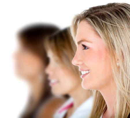 Group Of Females In A Row Smiling Isolated Over A White Background Freestock Photos