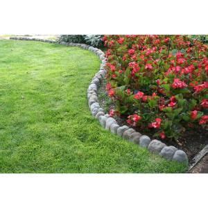 Manufactured by the original inventor of black poly use natural stone or wood lawn edging for large vegetable gardens or areas with flowers. Landecor Edgestone 4 in. x 12 in. x 3 in. Multi-Colored Concrete Overlapping RIVER ROCK Edging ...