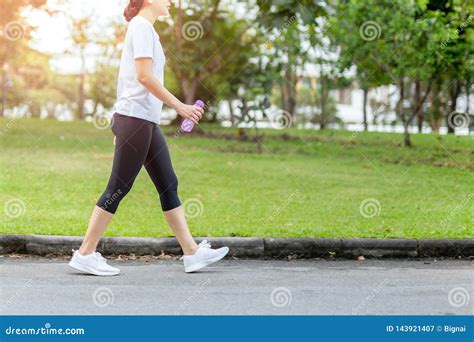 Woman Walking In The Park With Bottle Water In Summer Stock Image Image Of Person Exercise