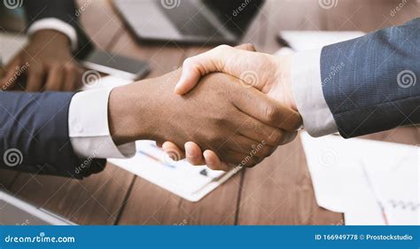 Handshake Of African American And Caucasian Business Partners Stock