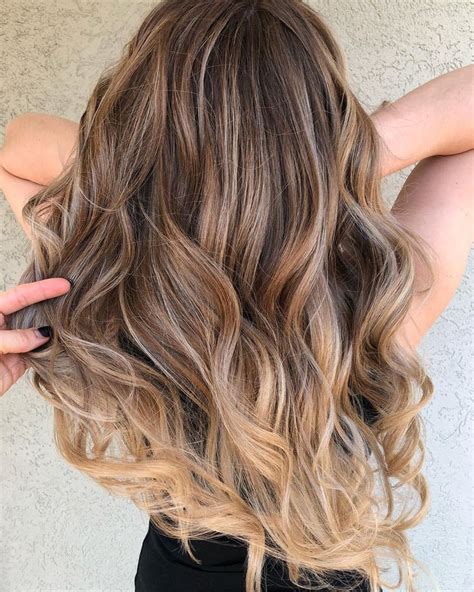 Warm Brown Balayage With Creamy Blonde Ends Brown Hair With Blonde Highlights Hair Color