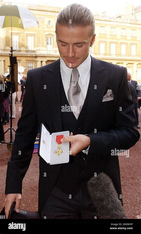 England Football Captain David Beckham With The Obe Officer Of The