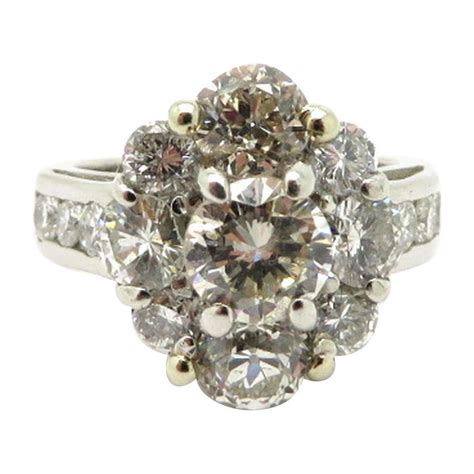 Estate Vintage Platinum Flower Design Diamond Engagement Ring For Sale