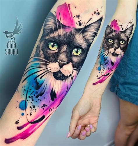 Two Cats On The Arm With Watercolor Splashes And Blue Eyes One Cat Is