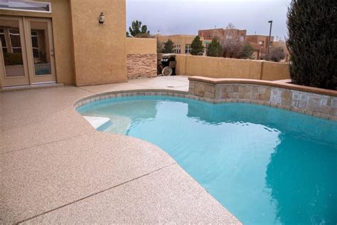 3 Reasons Why Concrete Coatings Will Keep Your Pool Deck Looking Better