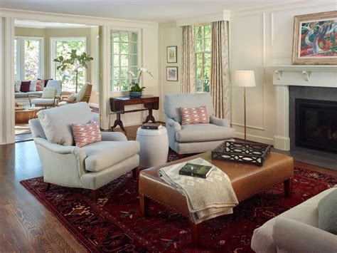 Traditional Living Room With Upholstered Chairs And Ottoman And