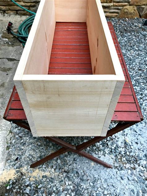 Adding legs to a raised bed brings it up to. How to Build a Planter Box with Legs | Chatfield Court ...