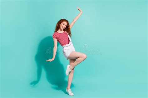 Full Length Body Size View Of Dreamy Lovely Cheerful Girl Dancing