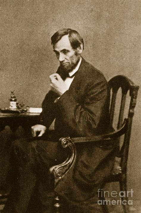 Abraham Lincoln Sitting At Desk Photograph By Mathew Brady