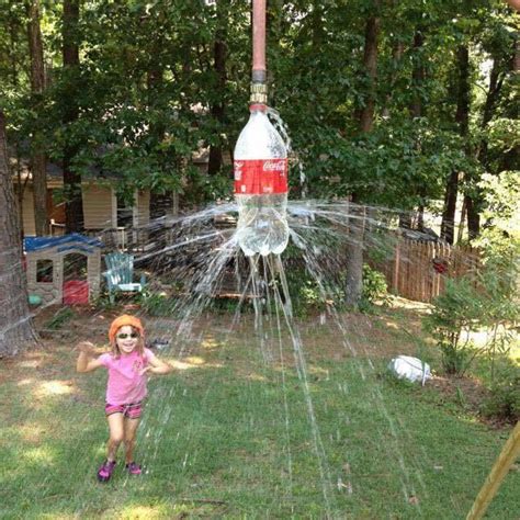 Diy Homemade Sprinkler From Plastic Bottle In Water Hose Backyard For