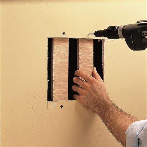 Cut larger holes into a square or rectangle, then create a patch out of drywall and attach it to the inside of the hole. Wall Doctor - Auckland & BOP Interior Plaster Repair Specialist