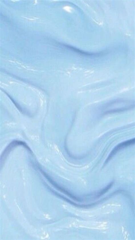 A Close Up View Of The Blue Paint That Looks Like It Has Been Swirled In