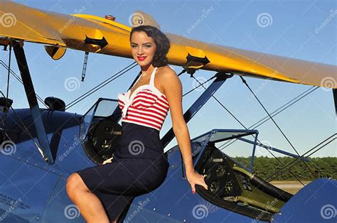 Pin Up Girl Standing On A Vintage Biplane Stock Image Image Of Beauty