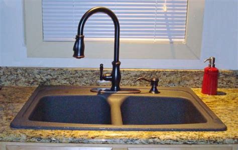 A detailed review of the best kitchen sink faucets to buy in 2021, from traditional, pull out and pull down, to faucets with sensors. Black Granite Kitchen Sink with Bronze Faucet | sink black ...