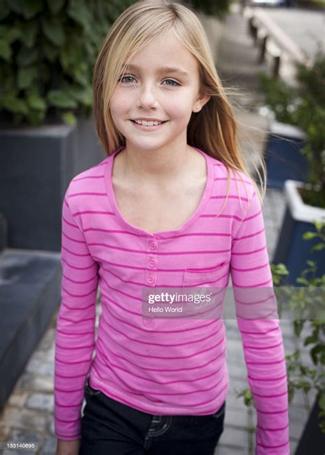 Portrait Of Young Girl Smiling High Res Stock Photo