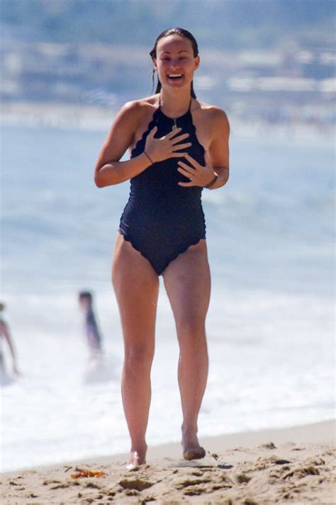 Olivia Wilde Looks Amazing In A Black Swimsuit As She Cools Down In The Ocean With A Friend In