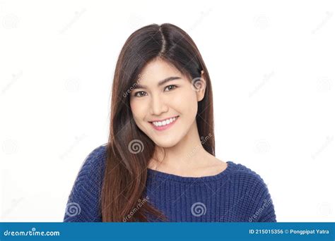 asian girl pretty cute smile clean and white aligned teeth standing on a white background stock