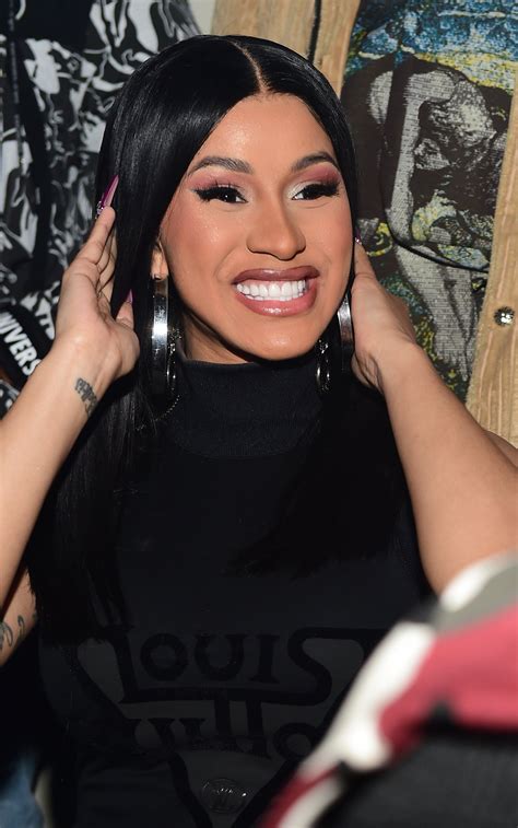 Watch Cardi B Show Off Her Dancing Skills In A Bright Red Outfit While At A House Party