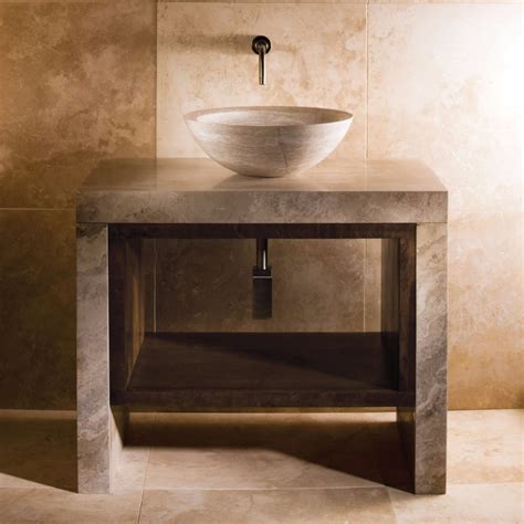 This sink is hand carved from 100% natural stone. 10 Stunning Sustainable Bathroom Vanities