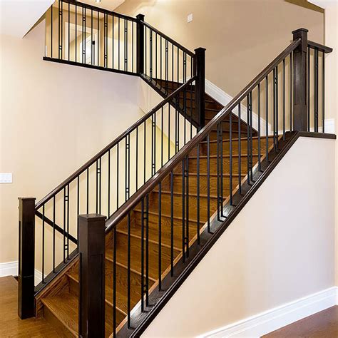 Metal Spindles With A Wooden Hand Rail Artistic Stairs And Railings