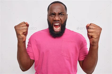 Anger Concept Outraged Dark Skinned Bearded Man Clenches Fists