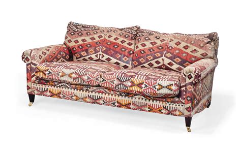 Rug store offers a range of kilim sofa. A GEORGE SMITH KILIM-UPHOLSTERED SOFA , OF RECENT ...