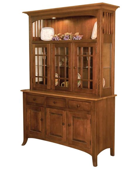 Proudly display your favorite dishes, vases, teacups, and other treasures behind the glass door with mullions, while buffet bases. Newport Hutch - Amish Direct Furniture