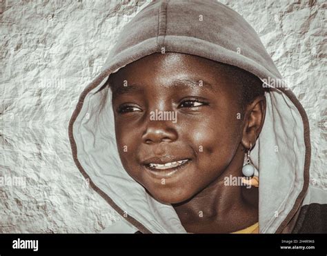Beautiful Portrait Of Smiling And Laughing Black African Children Stock