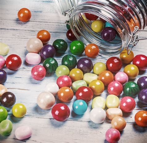 Glass Jar With Chewing Gum Round In Different Colors Stock Photo